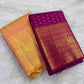 Close view of warm gold ornamental registers on Antique Rose Kanchipuram silk border.