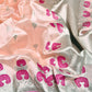 Close view of Peach Blush Chanderi silk saree with small metallic buttas and magenta woven border motifs