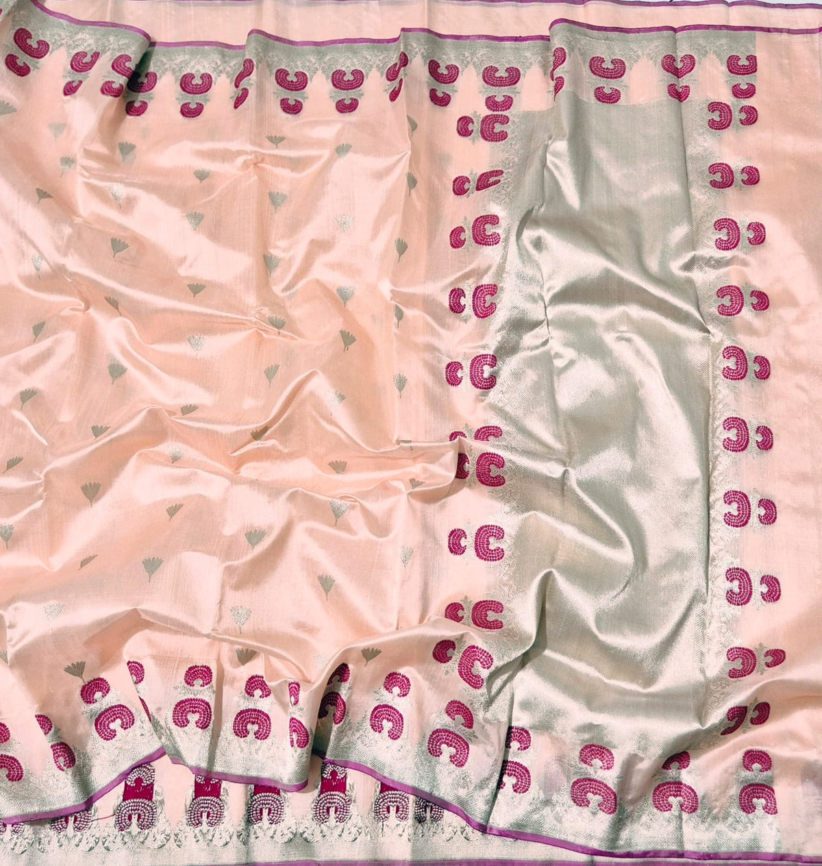 Peach blush handloom Pattu Silk Chanderi saree with silver-toned woven buttas and magenta ornamental border