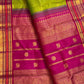 Dense zari pallu with Vanasringaram, Yaanai and Mayil motifs on a green Vairaoosi Kanchipuram saree.