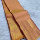 Peach Gold pure silk KanchiPattu Butta saree with Antique Rose warm gold zari border.