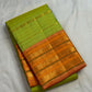 Dense zari pallu with Vanasringaram, Yaanai and Mayil motifs on a soft green Kanchipuram Vairaoosi saree.
