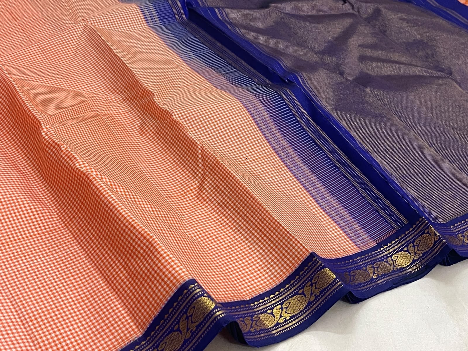 Soft peach ivory pure silk Kanchi Kattam saree, draped front view