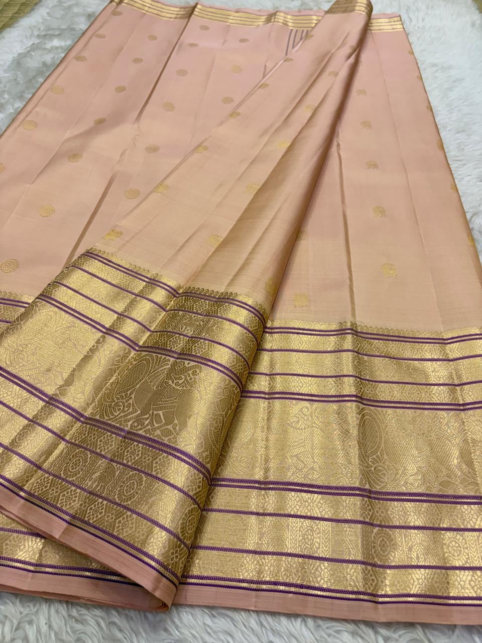 Purple silk stripe varisaipet border detail on peach handwoven Kanchipuram saree — Idam Living