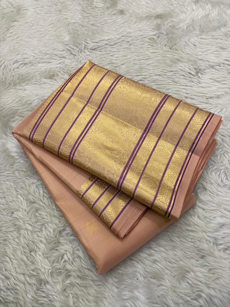 Full view of peach handwoven Kanchipuram pure silk saree with varisaipet mayil butta border — Idam Living
