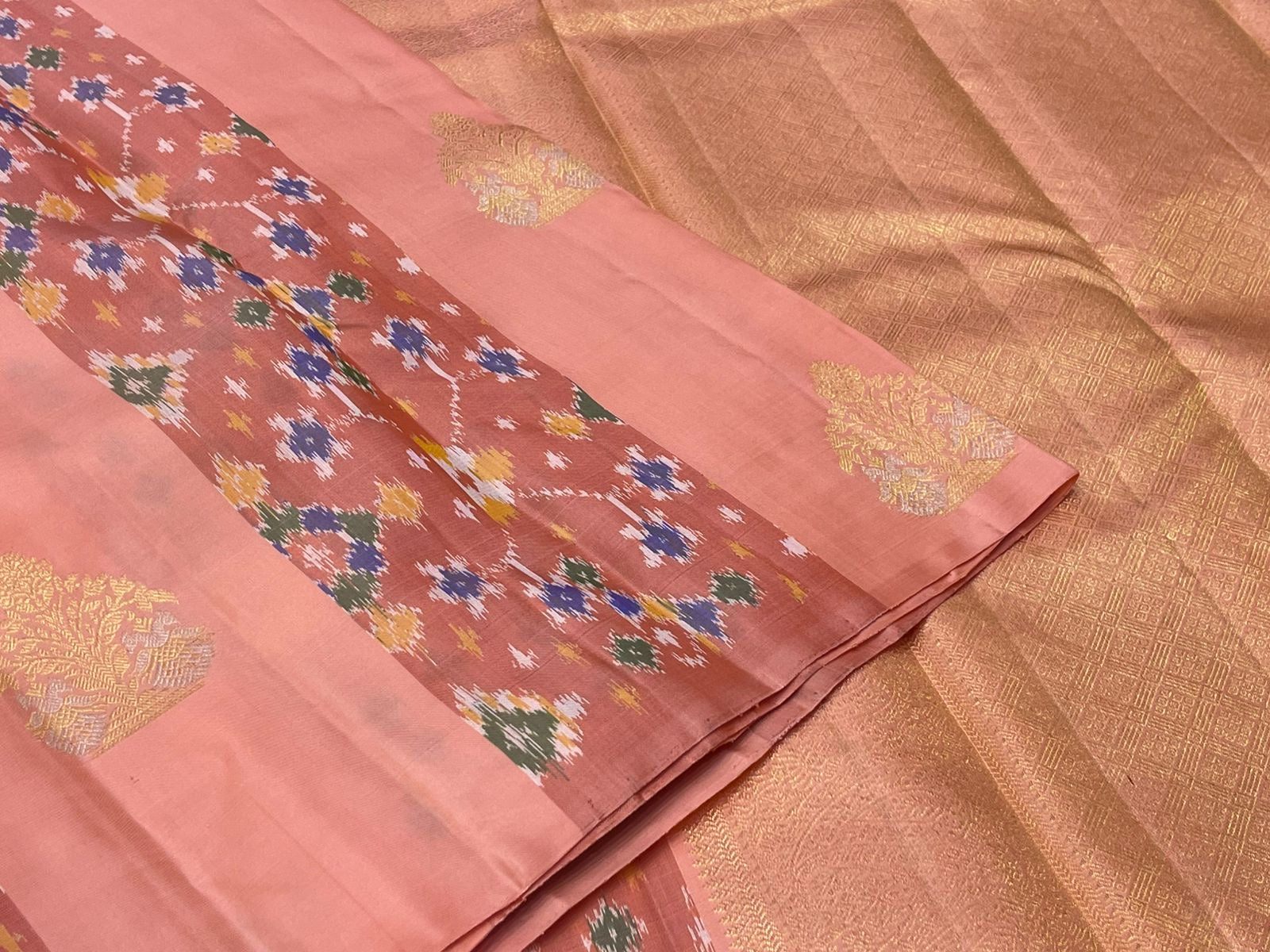 Close view of peach Kanjeevaram silk saree body with hexagonal silk thread butta — Idam Living