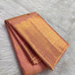 Soft Peach Blush Kanchipuram Zari Kattam saree showing petite gold buttas and broad traditional zari border.