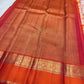 Soft peach pink Kanjipuram Korvai saree, close drape view