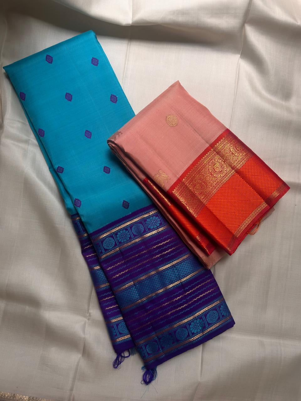 Soft peach pink Kanjipuram Korvai saree with vermilion border