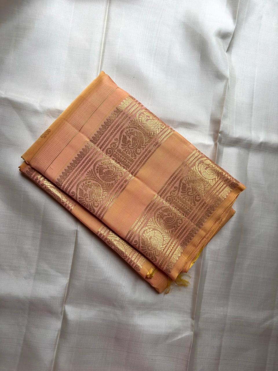 Peach Handwoven Pure Silk Kancheepuram Saree with Rettapet and Peacock Border