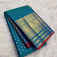 Sapphire Blue pure silk Kanchipuram Butta saree with antique-gold zari border and Red selvedge.