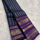 Grand pallu with dense gold zari bands on peacock blue Kanjivaram silk saree