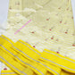 Ivory and marigold yellow Chanderi Pattu Silk saree, alternate view of the shimmering pale-gold striped pallu.