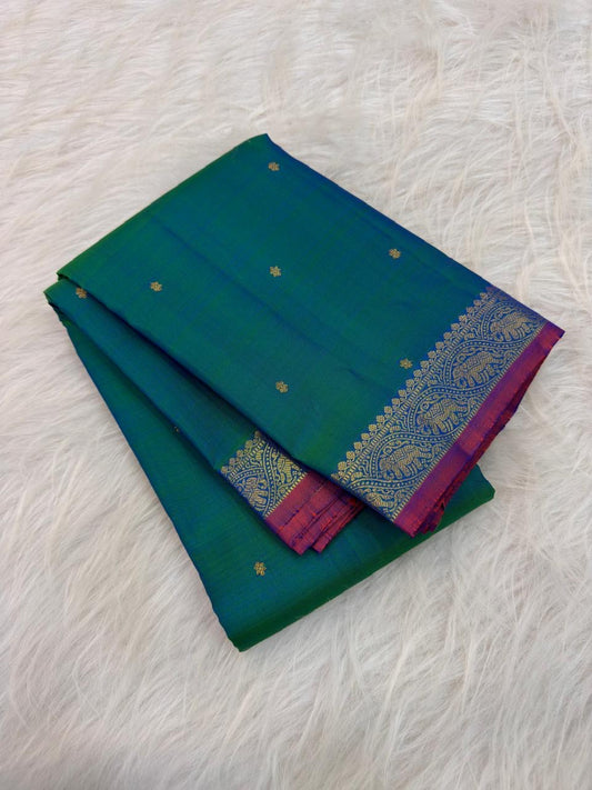 Peacock Blue Handwoven Pure Silk KanchiPattu Saree with Small Gold Buttas & Petite Zari Elephant Border