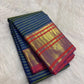 Close view of the peacock blue and deep green with fine gold zari stripes body with needle-fine Vairaoosi stripes and zari threads.