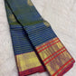 Blue Vairaoosi pure silk Kanchipuram saree with fine zari stripes, decorative buttas and contrast border.