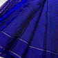 Minimalist blue Kancheepuram silk saree with refined gold zari detailing and timeless South Indian weave aesthetic