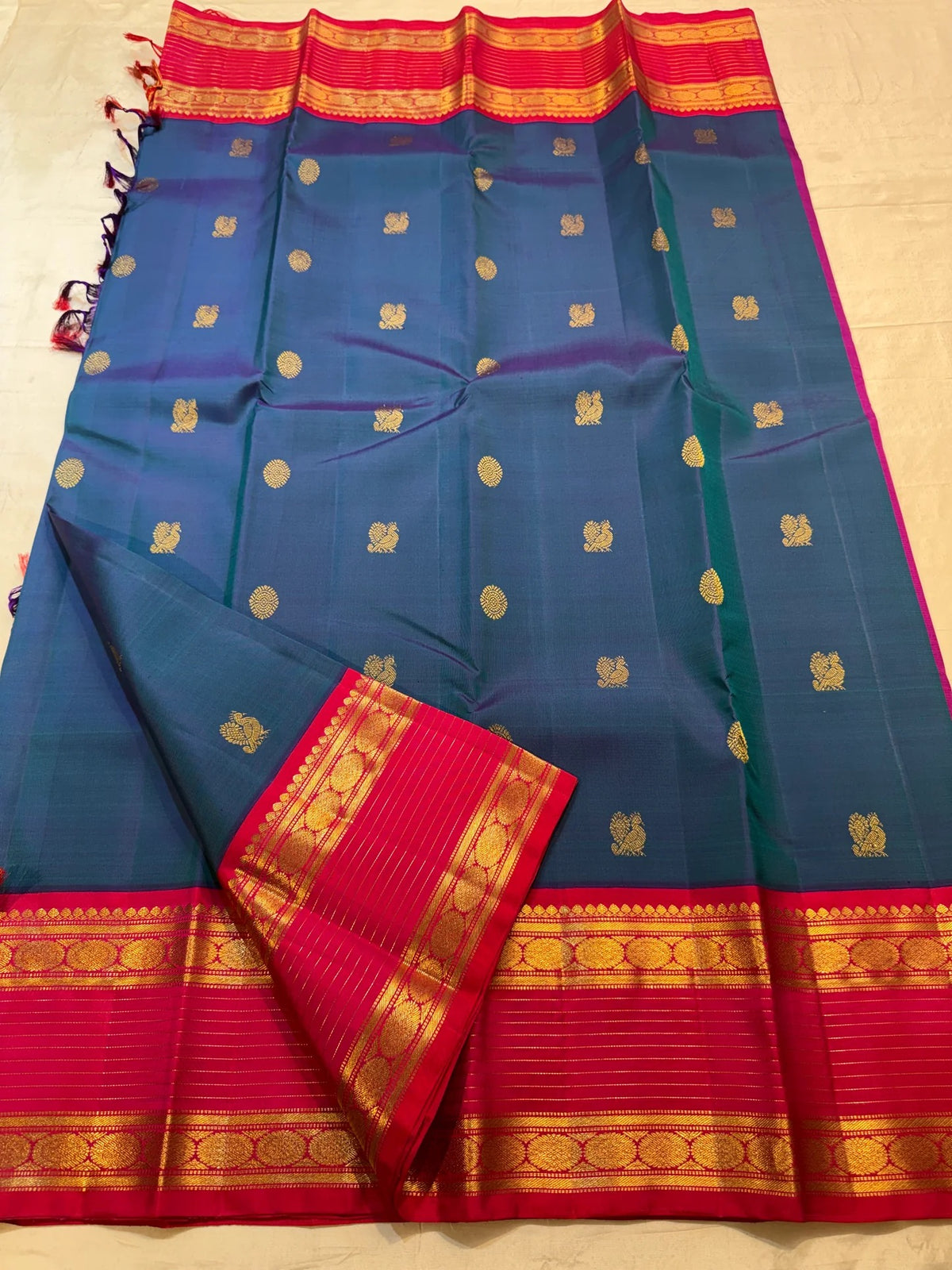 Peacock Blue and Rani Pink handwoven pure mulberry silk Rettapet saree by Idam Living.