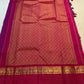 Close view of Mayil and circular Chakram zari buttas across Peacock Blue pure silk saree.