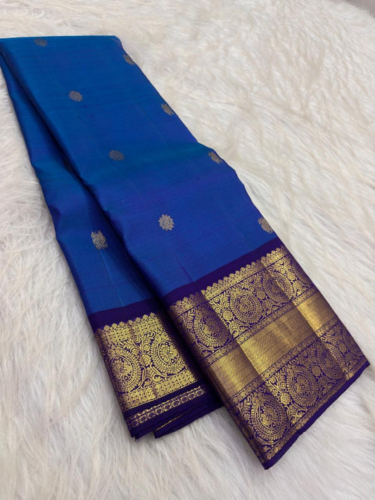 Peacock Blue Handwoven Pure Silk Kancheepuram Saree with Gold Buttas and Deep Violet Zari Border