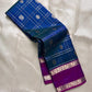 Handwoven Pure Silk Kancheepuram saree in jewel-toned peacock blue and Kathiripoo purple.