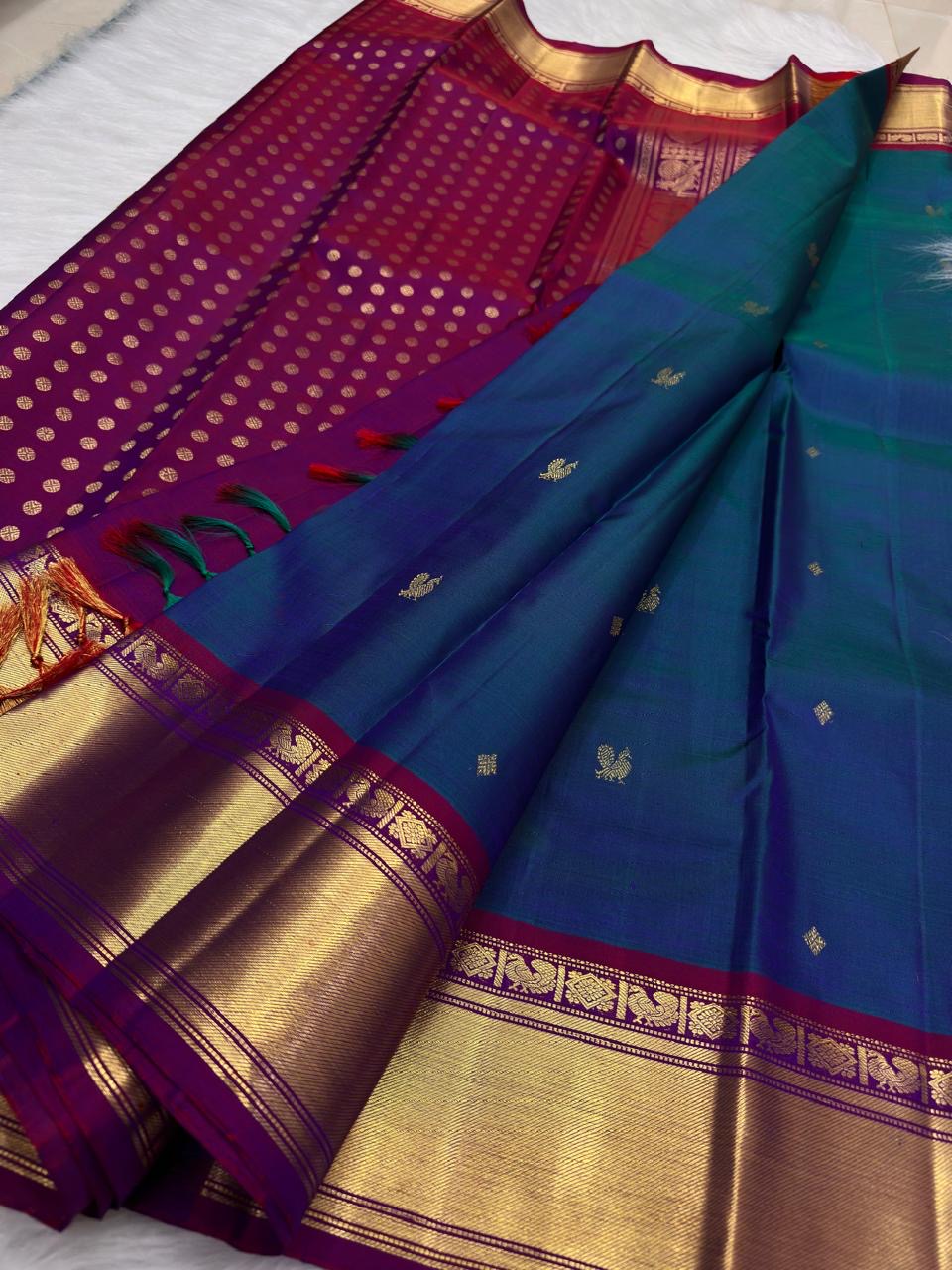 Peacock Blue Handwoven Pure Silk Kanchipuram Saree with Petite Zari Buttas and Magenta Gold Border