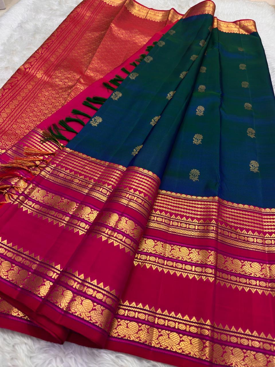 Peacock Blue Handwoven Pure Silk Kanjivaram Saree with Varisaipet Chedi Butta and Korvai Magenta Border