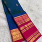 Peacock Blue Handwoven Pure Silk Kanjivaram Saree with Varisaipet Chedi Butta and Korvai Magenta Border