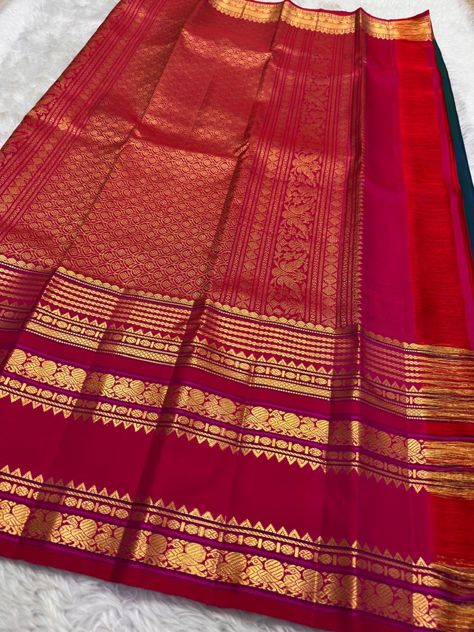 Peacock Blue Handwoven Pure Silk Kanjivaram Saree with Varisaipet Chedi Butta and Korvai Magenta Border