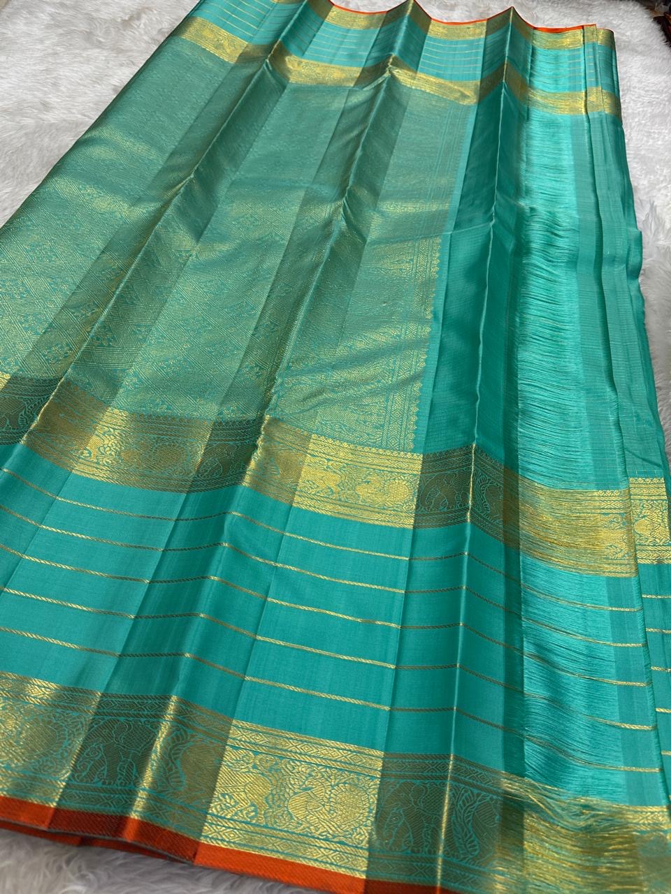 Shot Aqua Turquoise and Sea Green Handwoven Pure Silk Kanchi Pattu Saree with Zari Kattam Butta and Vanasringaram Border