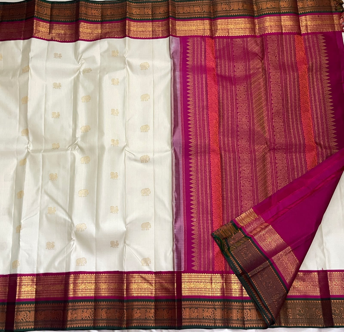 Sandalwood Ivory Handwoven Pure Silk Kanjivaram Korvai Saree with Peacock and Elephant Motifs, contrasting zari border detail