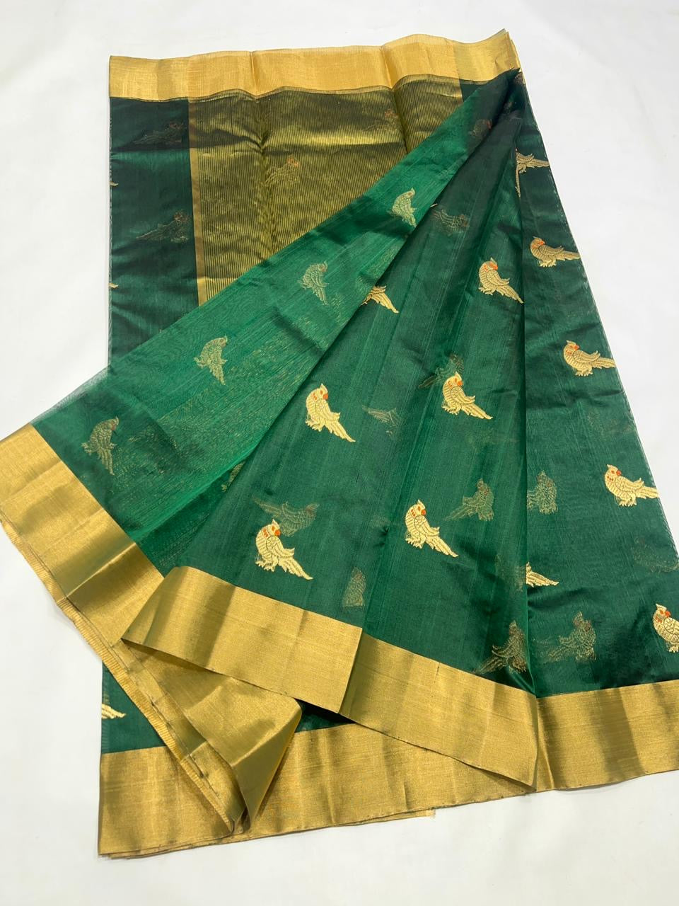 Traditional green Chanderi silk saree with classic gold zari border and rich handcrafted detailing