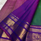 traditional tested zari detail on peacock green Kanchipuram silk saree