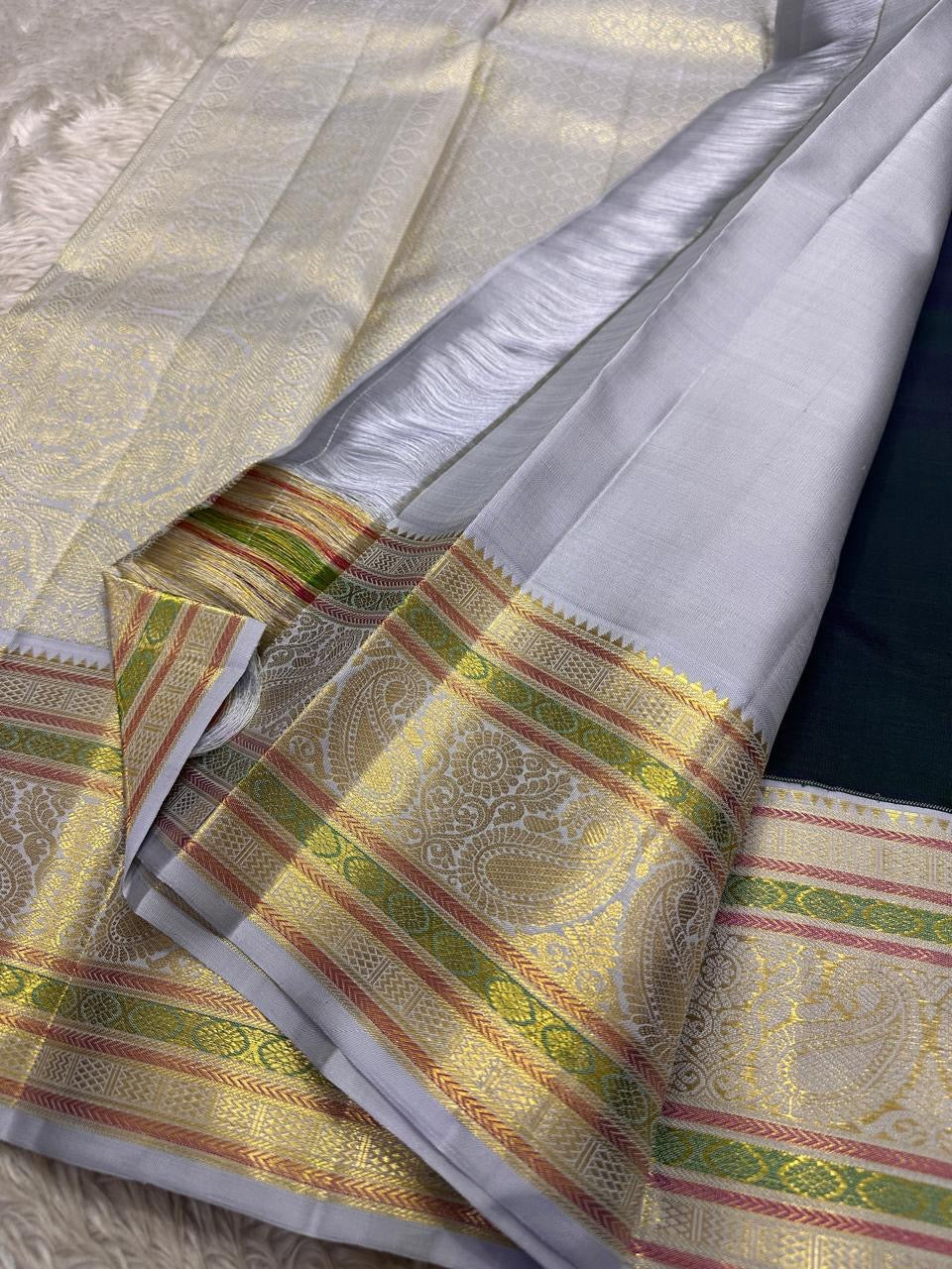 Mayil Kazhuthu Kanchipuram saree with large floral-tree zari buttas and silver border