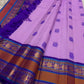 Peacock motif border with zari and turquoise silk thread on lavender Kanjivaram saree, border close up