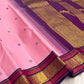 Close view of the peacock motif border on lotus pink Pure Silk Kanchipuram