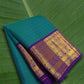 Pure Kanchipuram Korvai silk saree in peacock teal blue with royal purple contrast border