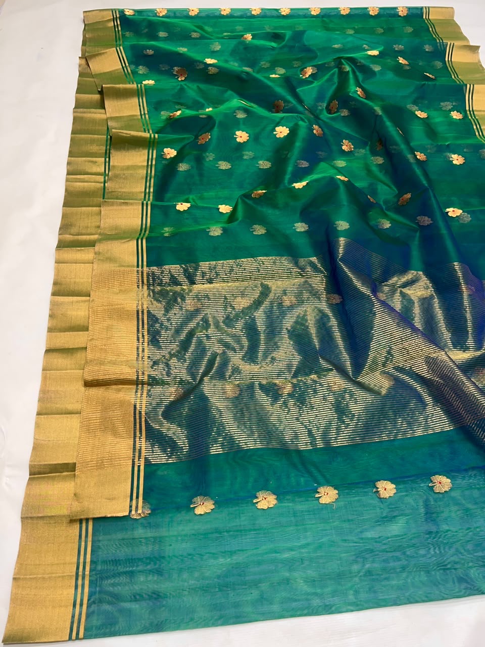 Peacock teal handloom Katan Silk Chanderi saree showing its drape