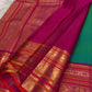 Kanchipattu silk saree in peacock teal with rani pink border Korvai Varisaipet weave traditional zari detail