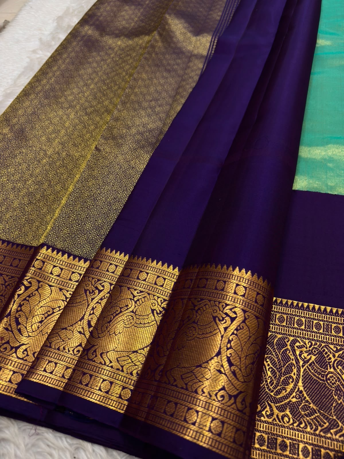 Deep purple korvai contrast border on peacock teal handwoven Kanchipuram pure silk saree — Idam Living