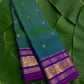 Peacock teal shot colour handwoven Kanjivaram pure silk saree with zari kattam body and sorgavasal peacock purple korvai border — Idam Living