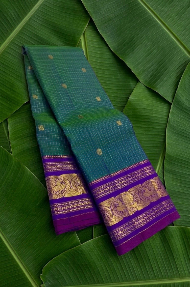 Peacock teal shot colour handwoven Kanjivaram pure silk saree with zari kattam body and sorgavasal peacock purple korvai border — Idam Living