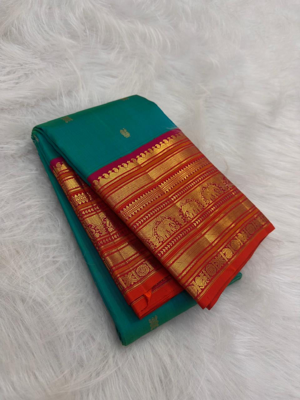 Peacock Teal KanchiPattu silk saree with vermilion Varisaipet elephant zari border — Idam Living