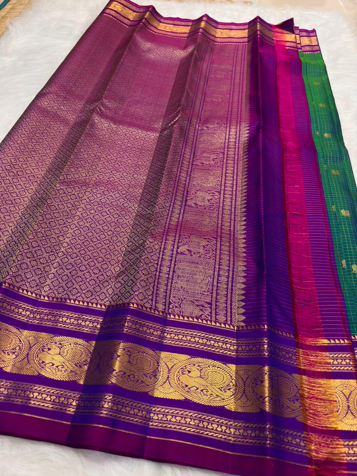 Sorgavasal peacock medallion close-up on peacock teal Kanchipuram pure silk saree — Idam Living