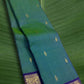 Peacock Teal Kanjivaram Silk Saree with Antique Gold Zari Kattam and Royal Violet Border