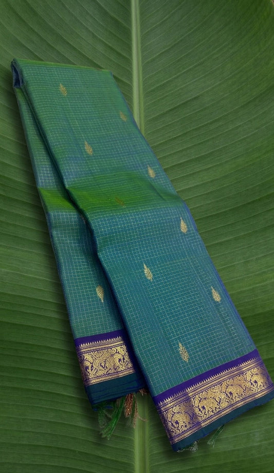 Peacock Teal Kanjivaram Silk Saree with Antique Gold Zari Kattam and Royal Violet Border