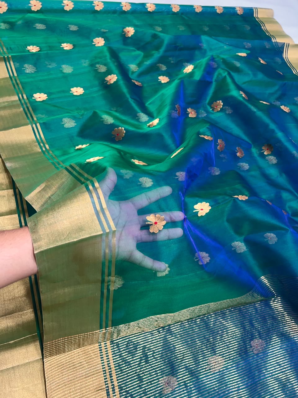 Peacock teal Katan Silk Chanderi saree with delicate gold floral motifs