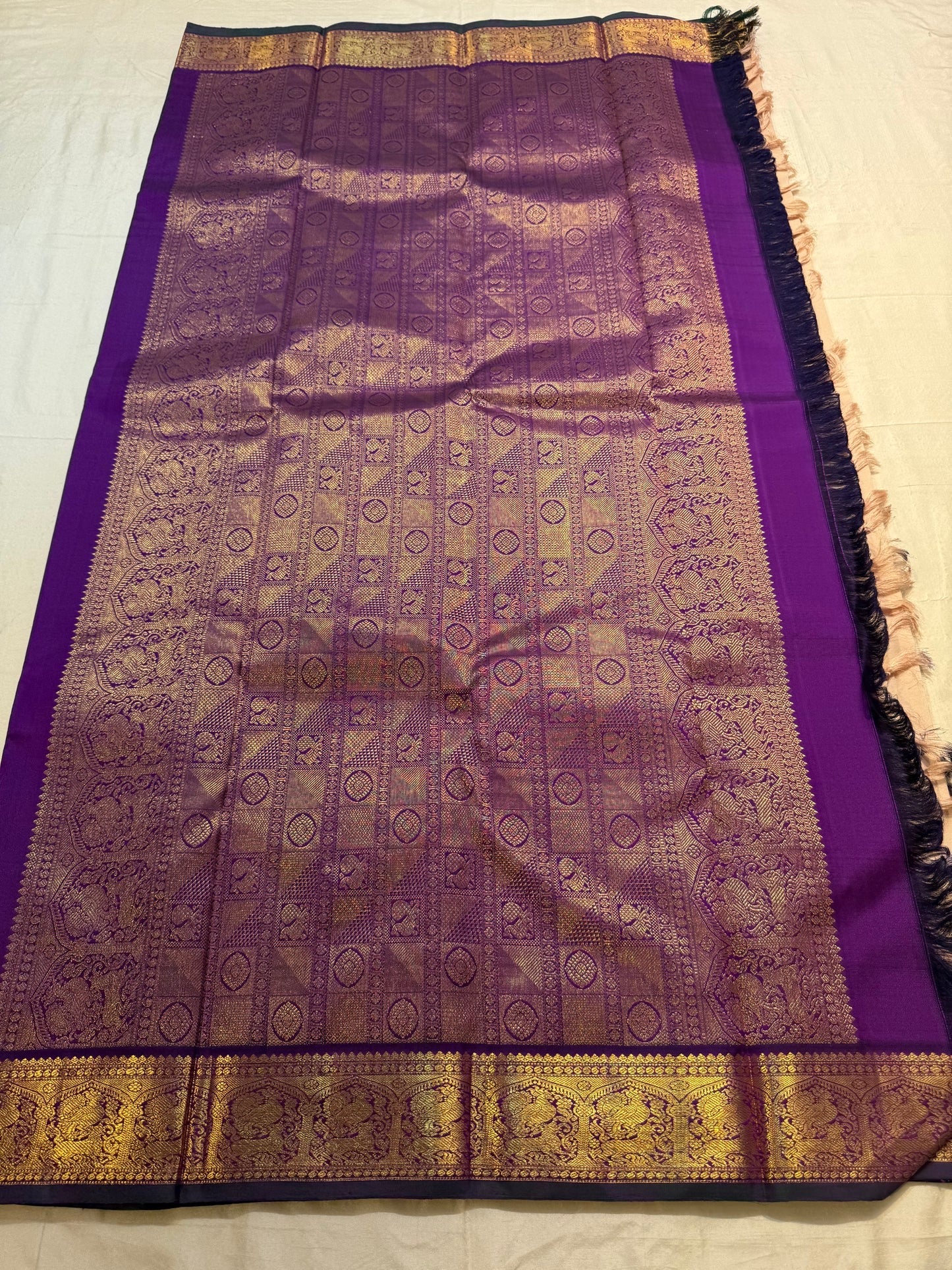 Pearl Beige and Deep Violet Handwoven Pure Silk KanchiPattu Saree with Mayil Chakram Butta and Korvai Border