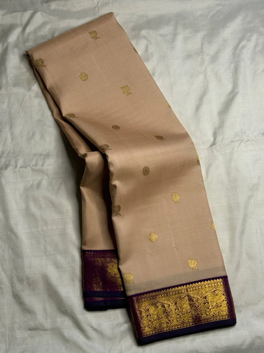 Pearl Beige and Deep Violet Handwoven Pure Silk KanchiPattu Saree with Mayil Chakram Butta and Korvai Border