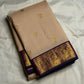 Pearl Beige and Deep Violet Handwoven Pure Silk KanchiPattu Saree with Mayil Chakram Butta and Korvai Border